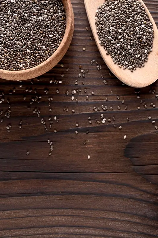 high-angle-chia-seeds-wooden-spoon copy